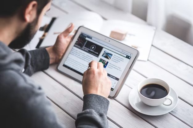 worker reading news with tablet 1162 83